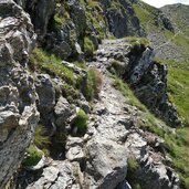 stoneman trail bei hollbrucker spitze felsiges gelaende tragestrecke